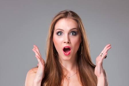 Redhead teen opens her mouth wide Redhead teen opens her mouth wide